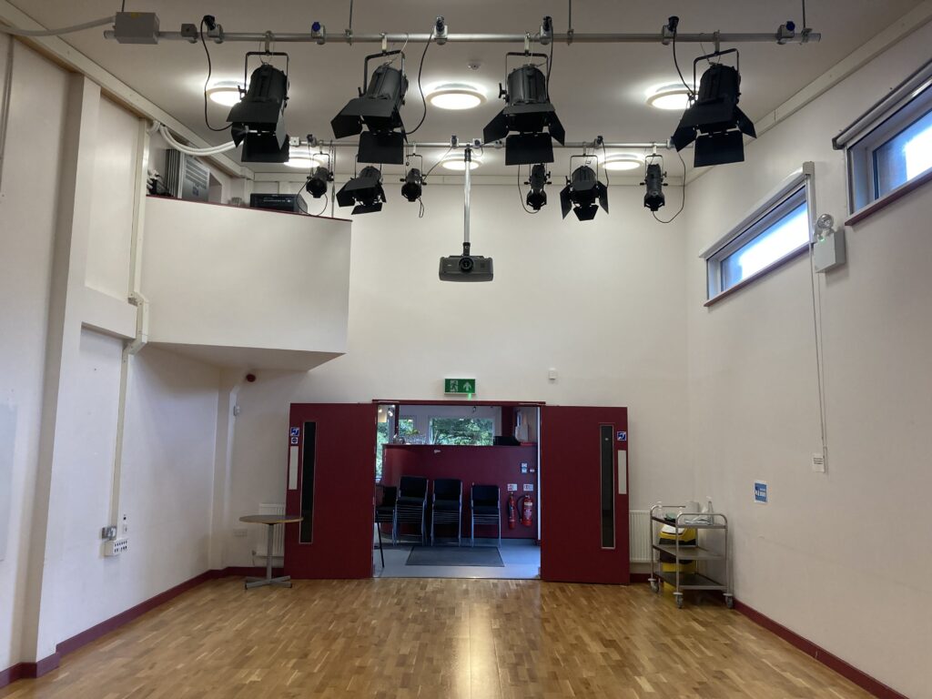 The empty studio room from a different angle - in this image you can see the lighting rig on the ceiling