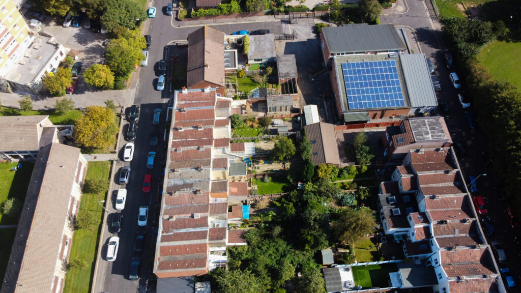 Aerial shot of our building showing the solar panels on our roof